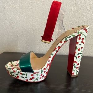 White Christian Louboutin heels